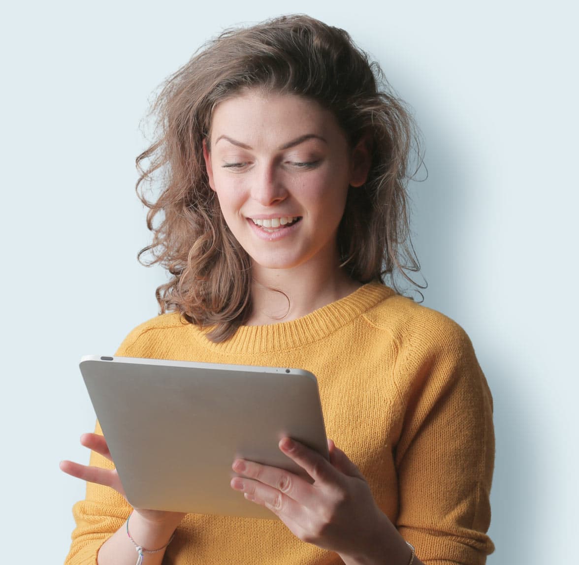 Finance professional reviewing business information on a tablet